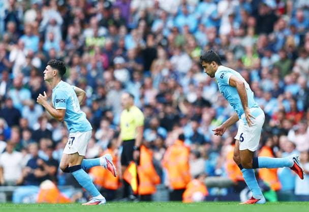 Phil Foden and Rodri of Manchester City enter the game Manchester City v Tottenham Hotspur, Premier League, Football, Etihad Stadium, Manchester, UK - 23 Aug 2025Manchester Etihad Stadium United Kingdom EDITORIAL USE ONLY No use with unauthorised audio, video, data, fixture lists, club league logos or live services. Online in-match use limited to 120 images, no video emulation. No use in betting, games or single club league player publications. Copyright: xMattxWest Shutterstockx 15449559ai