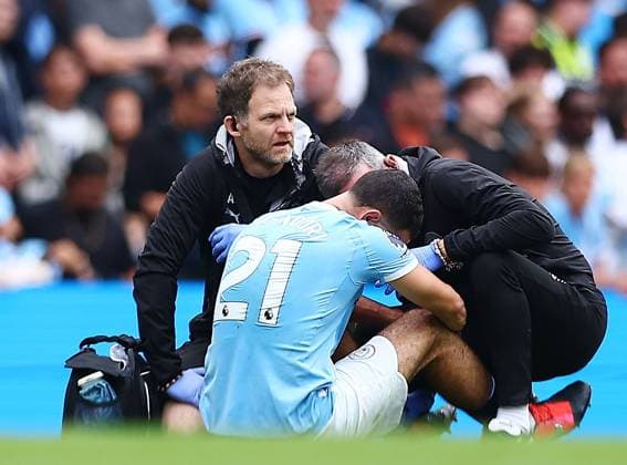 Rayan Ait-Nouri of Manchester City receives treatment for an injury Manchester City v Tottenham Hotspur, Premier League, Football, Etihad Stadium, Manchester, UK - 23 Aug 2025Manchester Etihad Stadium United Kingdom EDITORIAL USE ONLY No use with unauthorised audio, video, data, fixture lists, club league logos or live services. Online in-match use limited to 120 images, no video emulation. No use in betting, games or single club league player publications. Copyright: xMattxWest Shutterstockx 15449559bk