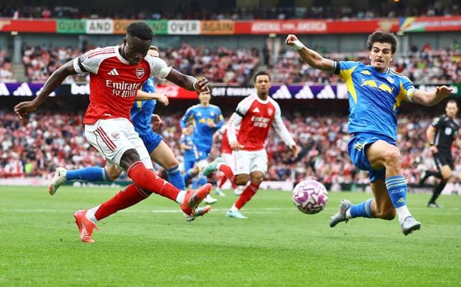 Bukayo Saka of Arsenal scores their sides second goal Arsenal v Leeds United, Premier League, Football, Emirates Stadium, London, UK - 23 Aug 2025London Emirates Stadium United Kingdom EDITORIAL USE ONLY No use with unauthorised audio, video, data, fixture lists, club league logos or live services. Online in-match use limited to 120 images, no video emulation. No use in betting, games or single club league player publications. Copyright: xMichaelxZemanek Shutterstockx 15451837y