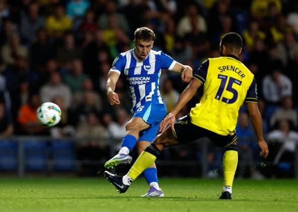 Brajan Gruda shoots to score the 2nd Brighton and Hove Albion goal as Brodie Spencer of Oxford United looks on Oxford United v Brighton and Hove Albion, EFL Carabao Cup, Second Round, Football, Kassam Stadium, Oxford, UK - 27 Aug 2025Oxford Kassam Stadium United Kingdom EDITORIAL USE ONLY No use with unauthorised audio, video, data, fixture lists, club league logos or live services. Online in-match use limited to 120 images, no video emulation. No use in betting, games or single club league player publications. Copyright: xMattxImpey Shutterstockx 15457586as