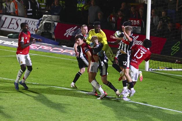 Andre Onana of Manchester United, ManU flaps at the ball which leads to the 2nd goal by Tyrell Warren of Grimsby Town Grimsby Town v Manchester United, EFL Carabao Cup, Second Round, Football, Blundell Park, Grimsby, UK - 27 Aug 2025Grimsby Blundell Park United Kingdom EDITORIAL USE ONLY No use with unauthorised audio, video, data, fixture lists, club league logos or live services. Online in-match use limited to 120 images, no video emulation. No use in betting, games or single club league player publications. Copyright: xPaulxCurrie Shutterstockx 15457582br