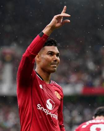 Manchester, England, 30th August 2025. Casemiro of Manchester United, ManU celebrates after scoring the opening goal during the Manchester United vs Burnley Premier League match at Old Trafford, Manchester. Picture credit should read: Andrew Yates Sportimage EDITORIAL USE ONLY. No use with unauthorised audio, video, data, fixture lists, club league logos or live services. Online in-match use limited to 120 images, no video emulation. No use in betting, games or single club league player publications. SPI_020_AY_MANUTD_BURNLEY SPI-4095-0020