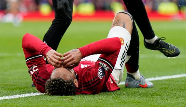 Manchester, England, 30th August 2025. Matheus Cunha of Manchester United, ManU lays injured during the Manchester United vs Burnley Premier League match at Old Trafford, Manchester. Picture credit should read: Andrew Yates Sportimage EDITORIAL USE ONLY. No use with unauthorised audio, video, data, fixture lists, club league logos or live services. Online in-match use limited to 120 images, no video emulation. No use in betting, games or single club league player publications. SPI_022_AY_MANUTD_BURNLEY SPI-4095-0023