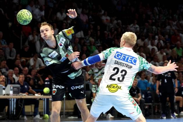 DEU, DHB, 1.HBL, Fuechse Berlin vs. SC Magdeburg, 06.09.2025, Max-Schmeling-Halle, Berlin, DEU, DHB, 1.HBL, Fuechse Berlin vs. SC Magdeburg, im Bild Mathias Gidsel (Fuechse Berlin 19), Magnus Saugstrup (SC Magdeburg 23)