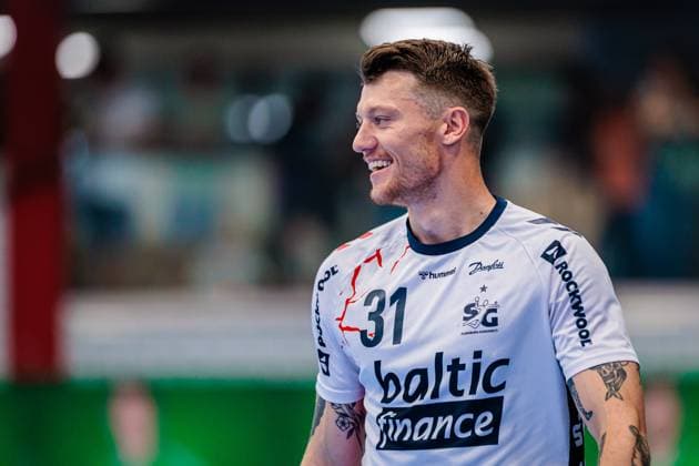Emil Jakobsen (SG Flensburg-Handewitt, 31) laechelt freut sich GER, GWD Minden vs. SG Flensburg-Handewitt, Handball, 1. Bundesliga, 3. Spieltag, Spielzeit 2025 2026, 08.09.2025 GER, GWD Minden vs. SG Flensburg-Handewitt, Handball, 1. Bundesliga, 3. Spieltag, Spielzeit 2025 2026, 08.09.2025 Luebbecke Copyright: xEibner-Pressefoto JanxRollingerx EP_JSK
