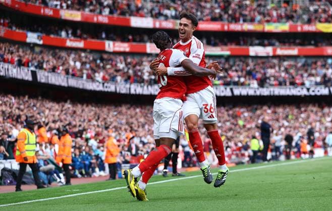 Martin Zubimendi of Arsenal celebrates scoring the opening goal with team-mate Noni Madueke Arsenal v Nottingham Forest, Premier League, Football, Emirates Stadium, London, UK - 13 Sept 2025London Emirates Stadium United Kingdom EDITORIAL USE ONLY No use with unauthorised audio, video, data, fixture lists, club league logos or live services. Online in-match use limited to 120 images, no video emulation. No use in betting, games or single club league player publications. Copyright: xMichaelxZemanek Shutterstockx 15481272cp