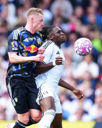 Sean Longstaff of Leeds United fouls Calvin Bassey of Fulham Fulham v Leeds United, Premier League, Football, Craven Cottage, London, UK - 13 Sept 2025London Craven Cottage United Kingdom EDITORIAL USE ONLY No use with unauthorised audio, video, data, fixture lists, club league logos or live services. Online in-match use limited to 120 images, no video emulation. No use in betting, games or single club league player publications. Copyright: xJavierxGarcia Shutterstockx 15481295ag