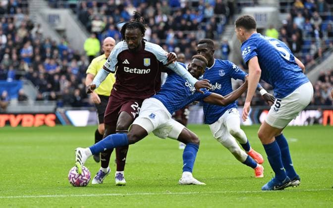Evann Guessand of Aston Villa is tackled by Tim Iroegbunam of Everton Everton v Aston Villa, Premier League, Football, Hill Dickinson Stadium, Liverpool, UK - 13 Sept 2025Liverpool Hill Dickinson Stadium United Kingdom EDITORIAL USE ONLY No use with unauthorised audio, video, data, fixture lists, club league logos or live services. Online in-match use limited to 120 images, no video emulation. No use in betting, games or single club league player publications. Copyright: xAnnaxGowthorpe Shutterstockx 15481294y