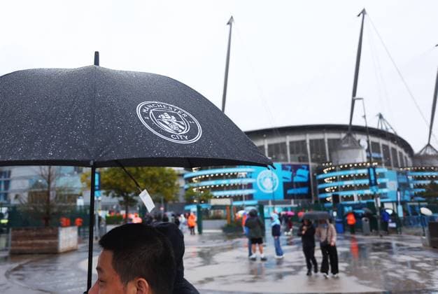 Fans make their way to the stadium in the rain Manchester City v Manchester United, ManU Premier League, Football, Etihad Stadium, Manchester, UK - 14 Sept 2025Manchester Etihad Stadium United Kingdom EDITORIAL USE ONLY No use with unauthorised audio, video, data, fixture lists, club league logos or live services. Online in-match use limited to 120 images, no video emulation. No use in betting, games or single club league player publications. Copyright: xMattxWest Shutterstockx 15481325f