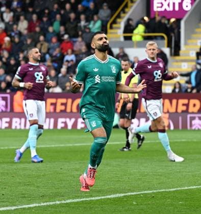 Mohamed Salah of Liverpool celebrates after scoring the team s first goal from a penalty Burnley v Liverpool, Premier League, Football, Turf Moor, Burnley, UK - 14 Sept 2025Burnley Turf Moor United Kingdom EDITORIAL USE ONLY No use with unauthorised audio, video, data, fixture lists, club league logos or live services. Online in-match use limited to 120 images, no video emulation. No use in betting, games or single club league player publications. Copyright: xAnnaxGowthorpe Shutterstockx 15481319ad
