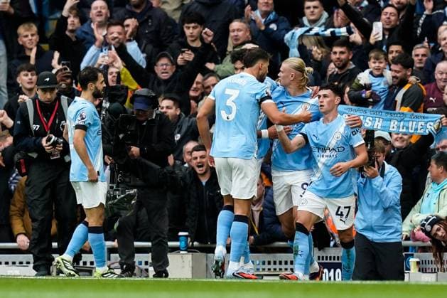 Manchester, England, 14th September 2025. Phil Foden of Manchester City celebrates his goal to make it 1-0 during the Manchester City vs Manchester United, ManU Premier League match at the Etihad Stadium, Manchester. Picture credit should read: Andrew Yates Sportimage EDITORIAL USE ONLY. No use with unauthorised audio, video, data, fixture lists, club league logos or live services. Online in-match use limited to 120 images, no video emulation. No use in betting, games or single club league player publications. SPI_025_AY_MCI_MUFC SPI-4139-0025