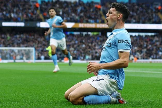 Phil Foden of Manchester City celebrates scoring the opening goal Manchester City v Manchester United, ManU Premier League, Football, Etihad Stadium, Manchester, UK - 14 Sept 2025Manchester Etihad Stadium United Kingdom EDITORIAL USE ONLY No use with unauthorised audio, video, data, fixture lists, club league logos or live services. Online in-match use limited to 120 images, no video emulation. No use in betting, games or single club league player publications. Copyright: xMattxWest Shutterstockx 15481325y