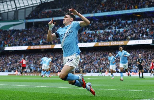 Phil Foden of Manchester City celebrates scoring the opening goal Manchester City v Manchester United, ManU Premier League, Football, Etihad Stadium, Manchester, UK - 14 Sept 2025Manchester Etihad Stadium United Kingdom EDITORIAL USE ONLY No use with unauthorised audio, video, data, fixture lists, club league logos or live services. Online in-match use limited to 120 images, no video emulation. No use in betting, games or single club league player publications. Copyright: xMattxWest Shutterstockx 15481325ab