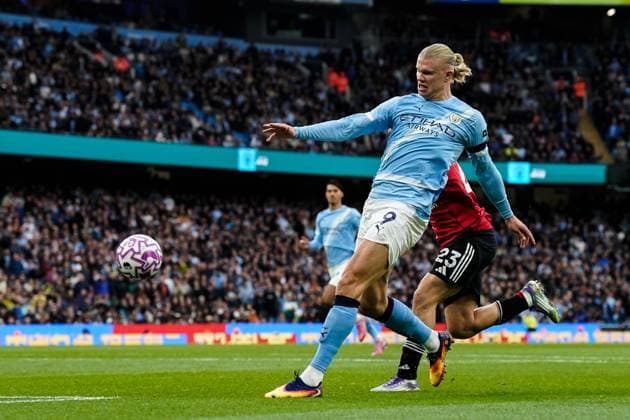 Manchester, England, 14th September 2025. Erling Haland of Manchester City scores a goal to make it 2-0 during the Manchester City vs Manchester United, ManU Premier League match at the Etihad Stadium, Manchester. Picture credit should read: Andrew Yates Sportimage EDITORIAL USE ONLY. No use with unauthorised audio, video, data, fixture lists, club league logos or live services. Online in-match use limited to 120 images, no video emulation. No use in betting, games or single club league player publications. SPI_044_AY_MCI_MUFC SPI-4139-0044