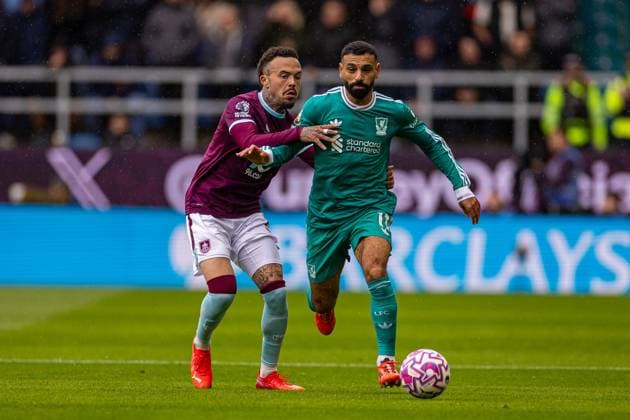 (250915) -- BURNLEY, Sept. 15, 2025 -- Liverpool s Mohamed Salah (R) vies for the ball during the English Premier League match between Burnley FC and Liverpool FC in Burnley, Britain, on Sept. 14, 2025. FOR EDITORIAL USE ONLY. NOT FOR SALE FOR MARKETING OR ADVERTISING CAMPAIGNS. NO USE WITH UNAUTHORIZED AUDIO, VIDEO, DATA, FIXTURE LISTS, CLUB LEAGUE LOGOS OR LIVE SERVICES. ONLINE IN-MATCH USE LIMITED TO 45 IMAGES, NO VIDEO EMULATION. NO USE IN BETTING, GAMES OR SINGLE CLUB LEAGUE PLAYER PUBLICATIONS. (SP)BRITAIN-BURNLEY-FOOTBALL-PREMIER LEAGUE-BURNLEY VS LIVERPOOL LixYing