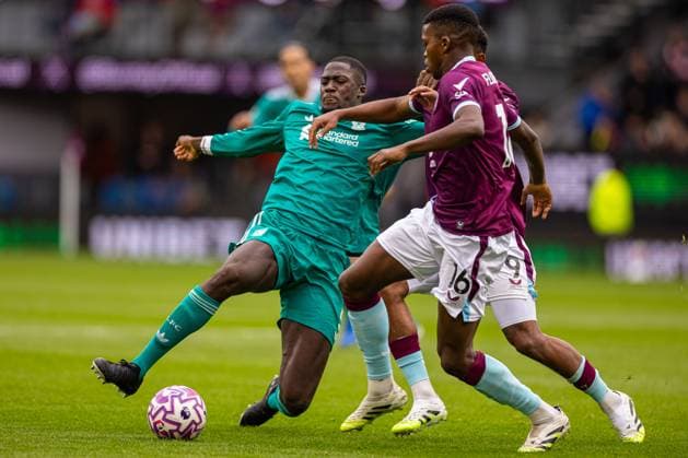 (250915) -- BURNLEY, Sept. 15, 2025 -- Liverpool s Ibrahima Konate (L) vies with Burnley s Florentino Luis during the English Premier League match between Burnley FC and Liverpool FC in Burnley, Britain, on Sept. 14, 2025. FOR EDITORIAL USE ONLY. NOT FOR SALE FOR MARKETING OR ADVERTISING CAMPAIGNS. NO USE WITH UNAUTHORIZED AUDIO, VIDEO, DATA, FIXTURE LISTS, CLUB LEAGUE LOGOS OR LIVE SERVICES. ONLINE IN-MATCH USE LIMITED TO 45 IMAGES, NO VIDEO EMULATION. NO USE IN BETTING, GAMES OR SINGLE CLUB LEAGUE PLAYER PUBLICATIONS. (SP)BRITAIN-BURNLEY-FOOTBALL-PREMIER LEAGUE-BURNLEY VS LIVERPOOL LixYing