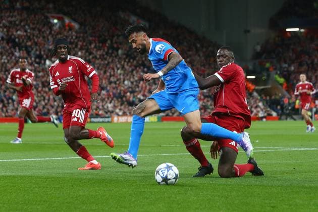 Ibrahima Konate of Liverpool tackles Nico Gonzalez of Atletico Madrid Liverpool v Atletico Madrid, UEFA Champions League, Group Stage, Football, Anfield, Liverpool, UK - 17 Sep 2025Liverpool Anfield United Kingdom EDITORIAL USE ONLY No use with unauthorised audio, video, data, fixture lists, club league logos or live services. Online in-match use limited to 120 images, no video emulation. No use in betting, games or single club league player publications. Copyright: xPhilxOldham Shutterstockx 15481355ad