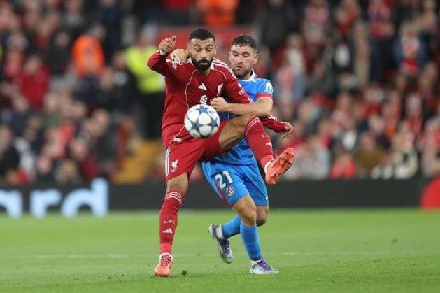 Javi Galan of Atletico Madrid and Mohamed Salah of Liverpool Liverpool v Atletico Madrid, UEFA Champions League, Group Stage, Football, Anfield, Liverpool, UK - 17 Sep 2025Liverpool Anfield United Kingdom EDITORIAL USE ONLY No use with unauthorised audio, video, data, fixture lists, club league logos or live services. Online in-match use limited to 120 images, no video emulation. No use in betting, games or single club league player publications. Copyright: xPhilxOldham Shutterstockx 15481355aj