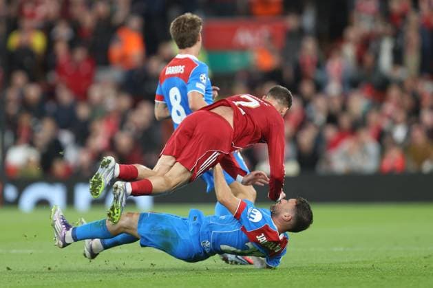 Javi Galan of Atletico Madrid fouls Florian Wirtz of Liverpool Liverpool v Atletico Madrid, UEFA Champions League, Group Stage, Football, Anfield, Liverpool, UK - 17 Sep 2025Liverpool Anfield United Kingdom EDITORIAL USE ONLY No use with unauthorised audio, video, data, fixture lists, club league logos or live services. Online in-match use limited to 120 images, no video emulation. No use in betting, games or single club league player publications. Copyright: xPhilxOldham Shutterstockx 15481355ah