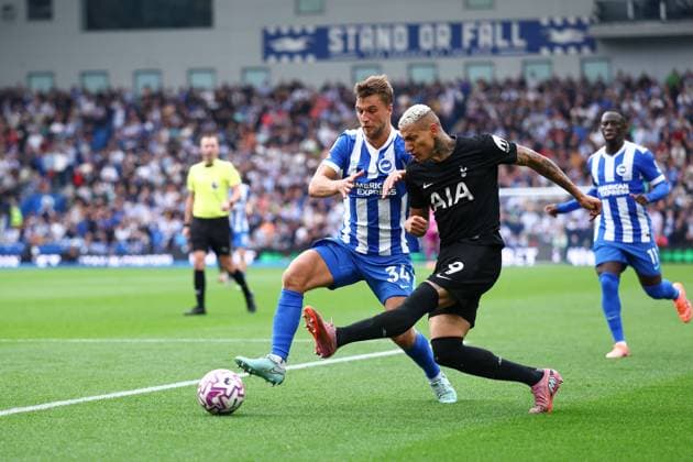 Richarlison of Tottenham Hotspur with a shot on goal under pressure from Joel Veltman of Brighton & Hove Albion Brighton and Hove Albion v Tottenham Hotspur, Premier League, Football, American Express Community Stadium, Brighton, UK - 20 Sep 2025Brighton American Express Community Stadi United Kingdom EDITORIAL USE ONLY No use with unauthorised audio, video, data, fixture lists, club league logos or live services. Online in-match use limited to 120 images, no video emulation. No use in betting, games or single club league player publications. Copyright: xSimonxDael Shutterstockx 15487085az