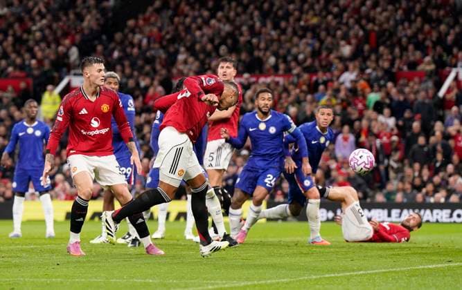 Manchester, England, 20th September 2025. Casemiro of Manchester United, ManU (C) scores the second goal during the Manchester United vs Chelsea Premier League match at Old Trafford, Manchester. Picture credit should read: Andrew Yates Sportimage EDITORIAL USE ONLY. No use with unauthorised audio, video, data, fixture lists, club league logos or live services. Online in-match use limited to 120 images, no video emulation. No use in betting, games or single club league player publications. SPI_021_AY_MAN_UTD_CHELSEA SPI-4149-0021