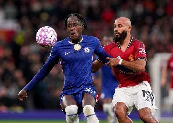 Manchester, England, 20th September 2025. Trevoh Chalobah of Chelsea (L) is challenged by Bryan Mbeumo of Manchester United, ManU during the Manchester United vs Chelsea Premier League match at Old Trafford, Manchester. Picture credit should read: Andrew Yates Sportimage EDITORIAL USE ONLY. No use with unauthorised audio, video, data, fixture lists, club league logos or live services. Online in-match use limited to 120 images, no video emulation. No use in betting, games or single club league player publications. SPI_028_AY_MAN_UTD_CHELSEA SPI-4149-0028