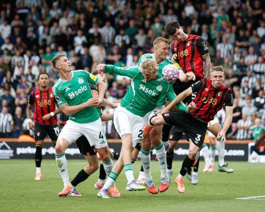 Newcastle players Sven Botman, Nick Woltemade and Dan Burn compete for the ball with AFC Bournemouth players Marcus Senesi and Adrien Truffert AFC Bournemouth v Newcastle United, Football, Vitality Stadium, Bournemouth, United Kingdom - 21 09 2025 EDITORIAL USE ONLY No use with unauthorised audio, video, data, fixture lists (outside the EU), club league logos or live services. Online in-match use limited to 45 images (+15 in extra time). No use to emulate moving images. No use in betting, games or Copyright: xMattxImpey Shutterstockx 15497419ax