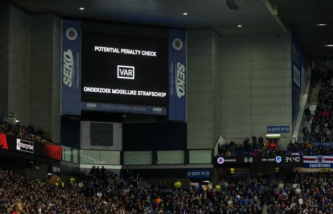 VAR check for potential penalty to Rangers for handball by Joris Kayembe of Genk. Decision - no penalty, foul to Genk. Rangers v Genk, UEFA Europa League, Football, Ibrox Stadium, Glasgow, Scotland, UK - 25 Sep 2025Glasgow Ibrox Stadium Scotland United Kingdom EDITORIAL USE ONLY No use with unauthorised audio, video, data, fixture lists, club league logos or live services. Online in-match use limited to 120 images, no video emulation. No use in betting, games or single club league player publications. Copyright: xStuartxWallace Shutterstockx 15498613ay