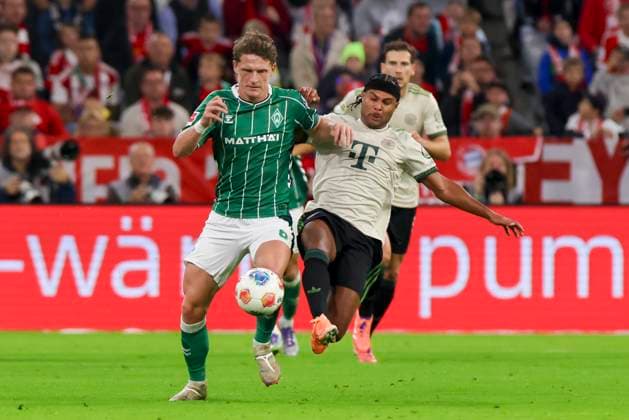 Jens Stage (Werder Bremen) und Serge Gnabry (FC Bayern Muenchen) kaempfen um den Ball, Bundesliga, FC Bayern München v SV Werder Bremen, Allianz Arena am 26. September 2025 in München, Deutschland. (Foto von Marco Steinbrenner DeFodi Images) Jens Stage (Werder Bremen) und Serge Gnabry (FC Bayern Muenchen) battle for the ball, Bundesliga, FC Bayern München v SV Werder Bremen, Allianz Arena, September 26, 2025 in München, Germany. (Photo by Marco Steinbrenner DeFodi Images) DFL regulations prohibit any use of photographs as image sequences and or quasi-video. Jens Stage Werder Bremen and Serge Gnabry FC Bayern Muenchen battle for the ball, Bundesliga, FC Bayern München v SV Werder Bremen, Allianz Arena, September 26, 2025 in Munich, Germany Photo by Marco Steinbrenner DeFodi Images Jens Stage Werder Bremen and Serge Gnabry FC Bayern Muenchen battle for the ball, Bundesliga, FC Bayern München v SV Werder Bremen, Allianz Arena, September 26, 2025 in München, Germany Photo by Marco Steinbrenner DeFodi Images DFL regulations prohibit any use of photographs as image sequences and or quasi video