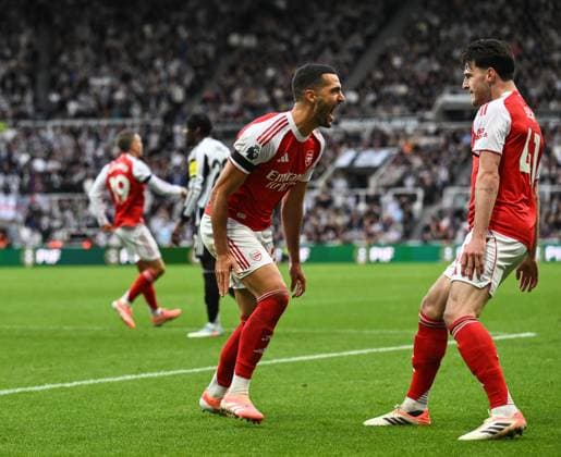 Mikel Merino of Arsenal (centre) celebrates scoring their first goal Newcastle United v Arsenal, Premier League, Football, St James Park, Newcastle, UK - 28 Sep 2025Newcastle St James Park United Kingdom EDITORIAL USE ONLY No use with unauthorised audio, video, data, fixture lists, club league logos or live services. Online in-match use limited to 120 images, no video emulation. No use in betting, games or single club league player publications. Copyright: xRichardxLee Shutterstockx 15503935dj