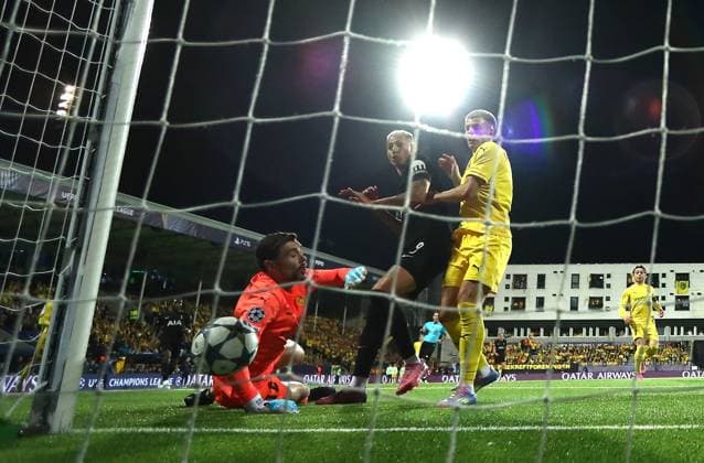 Jostein Gundersen of Bodo Glimt scores an own goal under pressure from Richarlison of Tottenham Hotspur FK Bodo Glimt v Tottenham Hotspur, UEFA Champions League, Group Stage, Football, Aspmyra Stadion, Bodo, Norway - 30 Sep 2025Bodo Aspmyra Stadion Norway EDITORIAL USE ONLY No use with unauthorised audio, video, data, fixture lists, club league logos or live services. Online in-match use limited to 120 images, no video emulation. No use in betting, games or single club league player publications. Copyright: xMichaelxZemanek Shutterstockx 15504026au