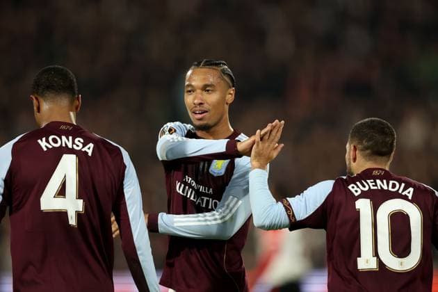 Boubacar Kamara of Aston Villa (centre) celebrates with goal scorer Emi Buendia (right) and Ezri Konsa after scoring their side s first goal of the game Feyenoord v Aston Villa, UEFA Europa League, Group Stage, Football, De Kuip, Rotterdam, Netherlands - 02 Oct 2025Rotterdam De Kuip Netherlands EDITORIAL USE ONLY No use with unauthorised audio, video, data, fixture lists, club league logos or live services. Online in-match use limited to 120 images, no video emulation. No use in betting, games or single club league player publications. Copyright: xBartxStoutjesdijk Shutterstockx 15504059cj