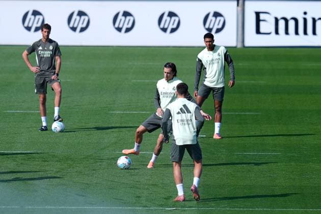 October 3, 2025, Valdebebas, Madrid, Spain: Alvaro Carreras of Real Madrid CF warms up during the training day of Real Madrid ahead the Spanish League, LaLiga EA Sports, football match against Villarreal CF at Ciudad Deportiva Real Madrid on October 03, 2025, in Valdebebas, Madrid, Spain. Valdebebas Spain - ZUMAa181 20251003_zaa_a181_016 Copyright: xDennisxAgyemanx