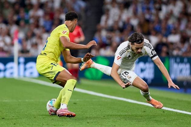Alvaro Fernandez Carreras of Real Madrid CF and Alvaro Mourino of Villarreal CF Real Madrid v Villarreal, La Liga, Football, Estadio Santiago Bernabu, Madrid, Spain - 04 Oct 2025Madrid Estadio Santiago Bernabu Spain EDITORIAL USE ONLY No use with unauthorised audio, video, data, fixture lists, club league logos or live services. Online in-match use limited to 120 images, no video emulation. No use in betting, games or single club league player publications. Copyright: xRubenxAlbarran Shutterstockx 15516230aw