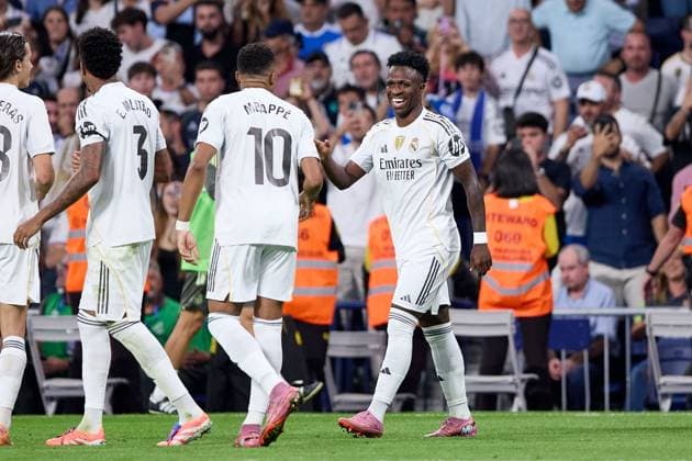 Vinicius Jr of Real Madrid CF celebrates with his teammates after scoring a goal Real Madrid v Villarreal, La Liga, Football, Estadio Santiago Bernabu, Madrid, Spain - 04 Oct 2025Madrid Estadio Santiago Bernabu Spain EDITORIAL USE ONLY No use with unauthorised audio, video, data, fixture lists, club league logos or live services. Online in-match use limited to 120 images, no video emulation. No use in betting, games or single club league player publications. Copyright: xRubenxAlbarran Shutterstockx 15516230bl