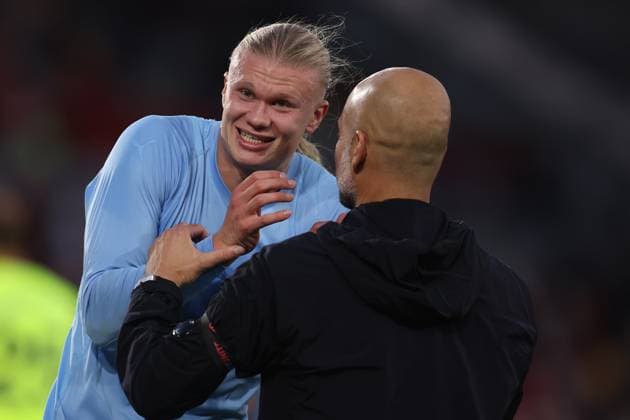 London, England, 5th October 2025. Erling Haaland of Manchester City and Josep Guardiola, Manager of Manchester City after the Brentford vs Manchester City Premier League match at Gtech Community Stadium, London. Picture credit should read: Paul Terry Sportimage EDITORIAL USE ONLY. No use with unauthorised audio, video, data, fixture lists, club league logos or live services. Online in-match use limited to 120 images, no video emulation. No use in betting, games or single club league player publications. SPI_037_PT_Brentford_Man_City SPI-4202-0037