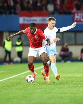 SOCCER - FIFA WC quali, AUT vs SMR VIENNA,AUSTRIA,09.OCT.25 - SOCCER - FIFA World Cup, WM, Weltmeisterschaft, Fussball 2026, European Qualifiers, group stage, OEFB international match, Länderspiel, Nationalmannschaft Austria vs San Marino. Image shows Kevin Danso (AUT) and Nicola Nanni (SMR). GEPAxpictures xArminxRauthner
