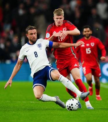 Jordan Henderson of England tackles Jordan James of Wales England v Wales, International Friendly, Länderspiel, Nationalmannschaft Football, Wembley Stadium, London, UK - 09 Oct 2025London Wembley Stadium United Kingdom EDITORIAL USE ONLY No use with unauthorised audio, video, data, fixture lists, club league logos or live services. Online in-match use limited to 120 images, no video emulation. No use in betting, games or single club league player publications. Copyright: xJavierxGarcia Shutterstockx 15522901ai