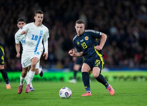 Lewis Ferguson of Scotland passes the ball while chased by Giannis Konstantelias of Greece Scotland v Greece, FIFA 2026 World Cup Qualifying, Group C, Football, Hampden Park, Glasgow, Scotland, UK - 09 Oct 2025Glasgow Hampden Park United Kingdom EDITORIAL USE ONLY No use with unauthorised audio, video, data, fixture lists, club league logos or live services. Online in-match use limited to 120 images, no video emulation. No use in betting, games or single club league player publications. Copyright: xStuartxWallace Shutterstockx 15522896es