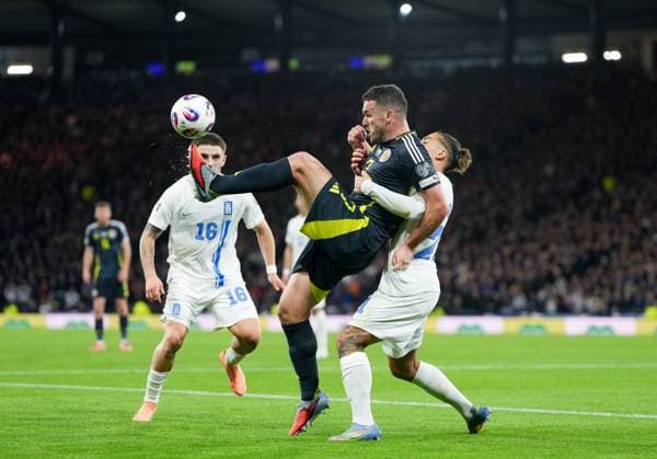 John McGinn of Scotland controls the ball under pressure from Kostas Tsimikas of Greece. Scotland v Greece, FIFA 2026 World Cup Qualifying, Group C, Football, Hampden Park, Glasgow, Scotland, UK - 09 Oct 2025Glasgow Hampden Park United Kingdom EDITORIAL USE ONLY No use with unauthorised audio, video, data, fixture lists, club league logos or live services. Online in-match use limited to 120 images, no video emulation. No use in betting, games or single club league player publications. Copyright: xStuartxWallace Shutterstockx 15522896fb