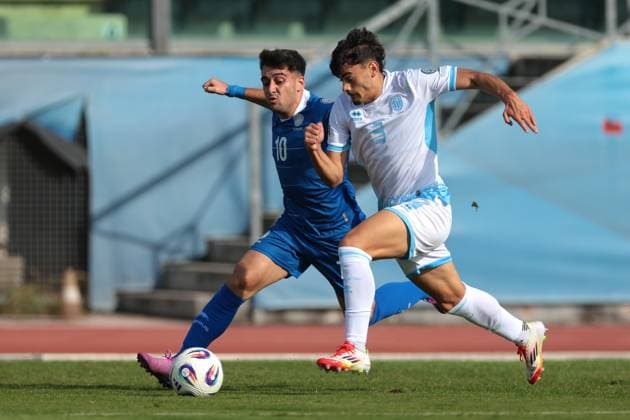 Serravalle, Italy, 12th October 2025. Alberto Riccardi of San Marino battles for possession with Loizos Loizou of Cyprus during the San Marino vs Cyprus FIFA World Cup, WM, Weltmeisterschaft, Fussball European Qualifying match at San Marino Stadium, Serravalle. Picture credit should read: Jonathan Moscrop Sportimage EDITORIAL USE ONLY. No use with unauthorised audio, video, data, fixture lists, club league logos or live services. Online in-match use limited to 120 images, no video emulation. No use in betting, games or single club league player publications. SPI_030_JM_SANMARINO_CYPRUS_EQ SPI-4191-0030