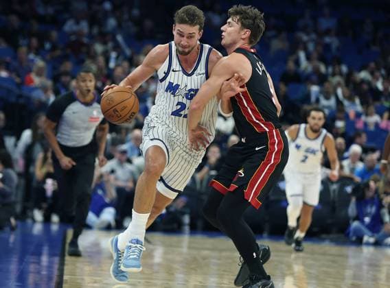 October 12, 2025, Orlando, Fl - Florida, USA: Orlando Magic forward Franz Wagner (22) pushes aside Miami Heat guard Pelle Larsson (right) during the NBA, Basketball Herren, USA preseason game at the Kia Center on Sunday, Oct. 12, 2025, in Orlando, Florida. Orlando USA - ZUMAm67_ 20251012_zaf_m67_003 Copyright: xStephenxM.xDowellx