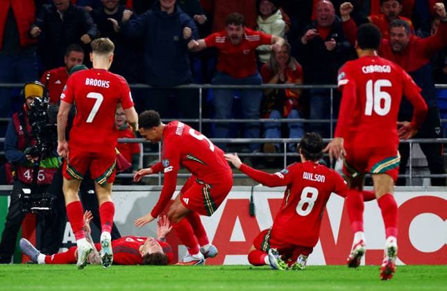 Joe Rodon of Wales celebrates scoring a goal after making the score 1-0. Wales v Belgium, FIFA 2026 World Cup Qualifying, Group J, Football, Cardiff City Stadium, Cardiff, Wales, UK - 13 Oct 2025Cardiff Cardiff City Stadium Wales United Kingdom EDITORIAL USE ONLY No use with unauthorised audio, video, data, fixture lists, club league logos or live services. Online in-match use limited to 120 images, no video emulation. No use in betting, games or single club league player publications. Copyright: xJamesxMarsh Shutterstockx 15523219aq