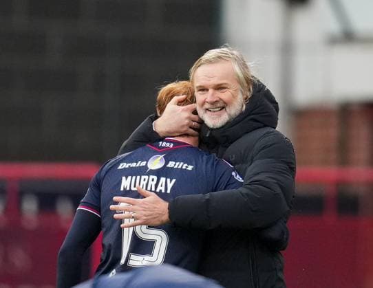 Dundee Head Coach Steven Pressley embraces Simon Murray of Dundee. Dundee v Celtic, William Hill Scottish Premiership, Football, Dens Park, Dundee, Scotland, UK - 19 Oct 2025Dundee Dens Park United Kingdom EDITORIAL USE ONLY No use with unauthorised audio, video, data, fixture lists, club league logos or live services. Online in-match use limited to 120 images, no video emulation. No use in betting, games or single club league player publications. Copyright: xStuartxWallace Shutterstockx 15545861cx