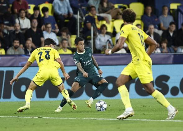 Savio of Manchester City is challenged by Sergi Cardona of Villarreal Villarreal v Manchester City, UEFA Champions League, Group Stage, Football, Estadi de la Cermica, Villarreal, Spain - 21 Oct 2025Villarreal Estadi de la Ceràmica United Kingdom EDITORIAL USE ONLY No use with unauthorised audio, video, data, fixture lists, club league logos or live services. Online in-match use limited to 120 images, no video emulation. No use in betting, games or single club league player publications. Copyright: xRubenxAlbarran Shutterstockx 15552307bs