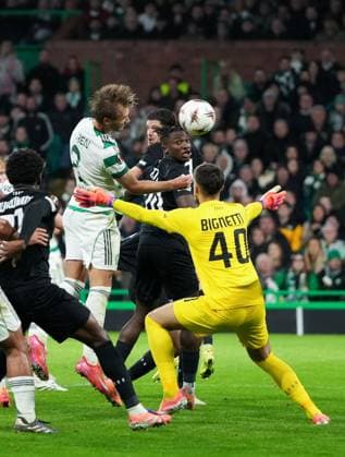 Benjamin Nygren of Celtic scores with a header past Matteo Bignetti of Sturm Graz to give Celtic. 2-1 lead. Celtic v Sturm Graz, UEFA Europa League, Group Stage, Football, Celtic Park, Glasgow, Scotland, UK - 23 Oct 2025Glasgow Celtic Park United Kingdom EDITORIAL USE ONLY No use with unauthorised audio, video, data, fixture lists, club league logos or live services. Online in-match use limited to 120 images, no video emulation. No use in betting, games or single club league player publications. Copyright: xStuartxWallace Shutterstockx 15567786cf