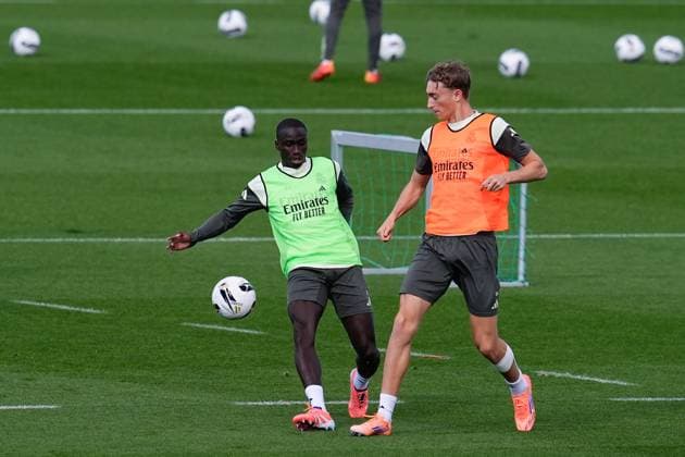 October 25, 2025, Valdebebas, Madrid, Spain: Dean Huijsen and Ferland Mendy during the Real Madrid training session ahead their upcoming Spanish League, LaLiga EA Sports, football match against FC Barcelona, Barca at Ciudad Deportiva Real Madrid on October 25, 2025, in Valdebebas, Madrid, Spain. Valdebebas Spain - ZUMAa181 20251025_zaa_a181_068 Copyright: xDennisxAgyemanx