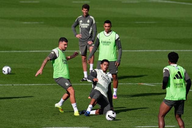 October 25, 2025, Valdebebas, Madrid, Spain: Dani Ceballos and Jude Bellingham during the Real Madrid training session ahead their upcoming Spanish League, LaLiga EA Sports, football match against FC Barcelona, Barca at Ciudad Deportiva Real Madrid on October 25, 2025, in Valdebebas, Madrid, Spain. Valdebebas Spain - ZUMAa181 20251025_zaa_a181_092 Copyright: xDennisxAgyemanx