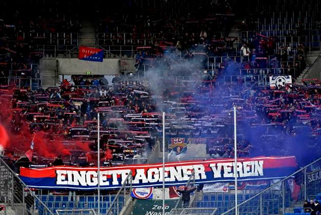 Fanblock, Fans, Fankurve, Flaggen, Fahnen, Stimmung, stimmungsvoll Bengalos, Pyrotechnik, Pyro, Feuerwerkskoerper, FC Heidenheim EINGETRAGENER VEREIN TSG 1899 Hoffenheim vs 1. FC Heidenheim 1846 FCH 25.10.2025 DFL REGULATIONS PROHIBIT ANY USE OF PHOTOGRAPHS AS IMAGE SEQUENCES AND OR QUASI-VIDEO TSG 1899 Hoffenheim vs 1. FC Heidenheim 1846 FCH