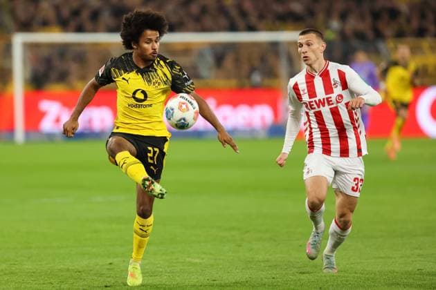 Zweikampf zwischen Karim Adeyemi (Borussia Dortmund, 27) und Kristoffer Lund (1.FC Koeln, 32) GER, Borussia Dortmund gegen 1.FC Koeln, Fussball, 1.Liga, 8.Spieltag, Spielzeit 2025 2026, 25.10.2025 DFL REGULATIONS PROHIBIT ANY USE OF PHOTOGRAPHS AS IMAGE SEQUENCES AND OR QUASI-VIDEO GER, Borussia Dortmund gegen 1.FC Koeln, Fussball, 1.Liga, 8.Spieltag, Spielzeit 2025 2026, 25.10.2025 Dortmund Copyright: xEibner-Pressefoto FrankxZeisingx EP_FZG
